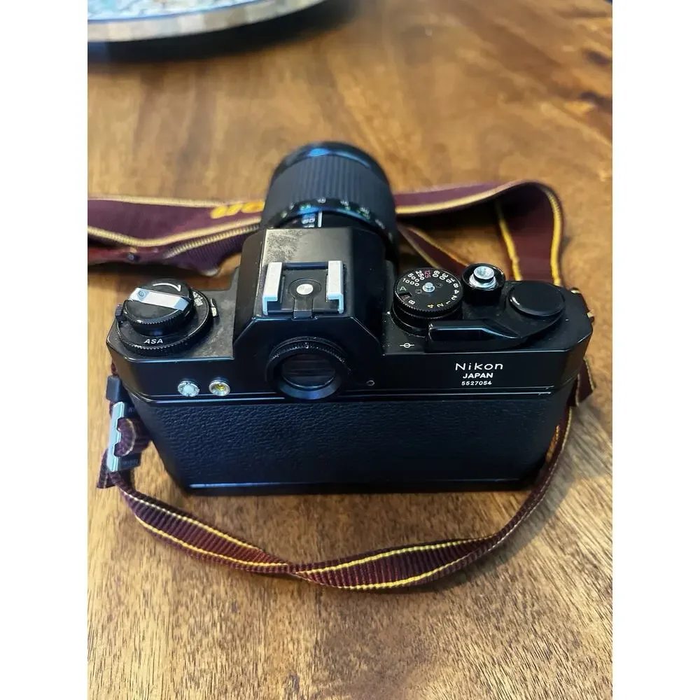 Nikon Black Camera with Brown Strap